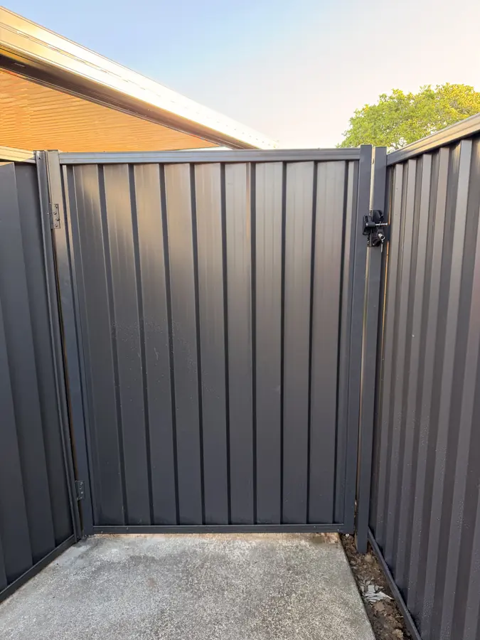Charcoal Colorbond single swing gate with a lockable latch